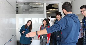 Juan Manuel Sanchez explaining to other students in the DTC